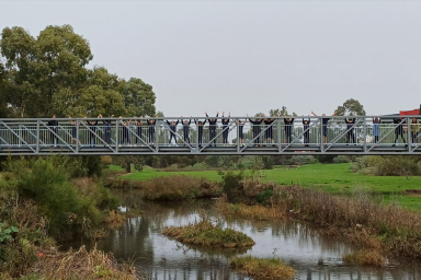 A bridge, connecting to pieces of lands for students to get across 