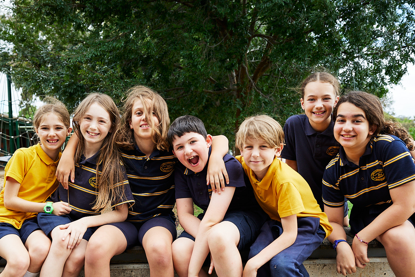 Photo of group of OSHC students together posing for photo outside