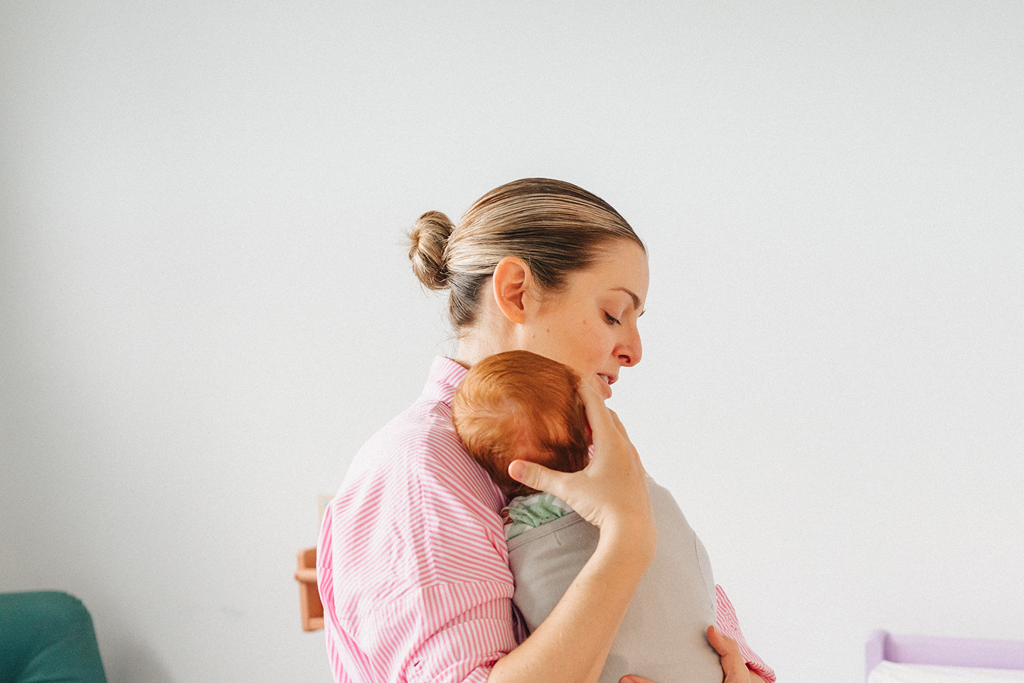 A mother holding a baby