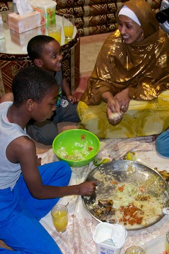 Family eating traditional meal together