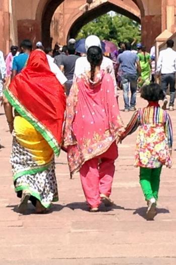 Two women and a girl in traditional Indian dress
