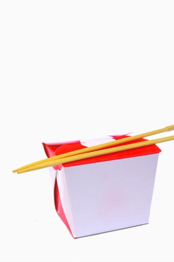 Chinese takeaway box with chopsticks