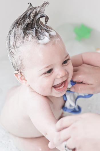 Baby having a bath.