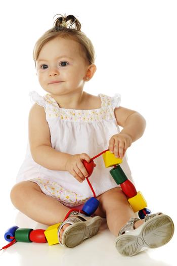 Toddler playing with a toy