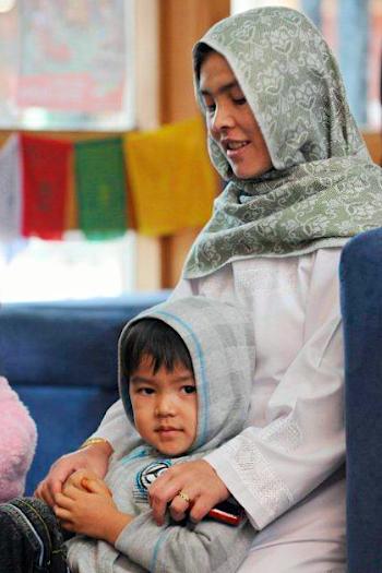 Mother and son wait for the doctor