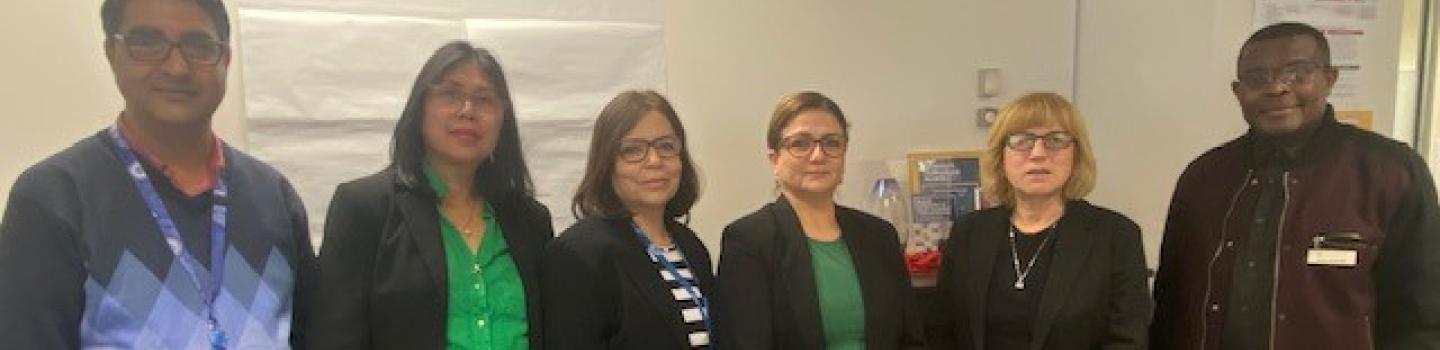 The six Community Liaison Officers standing side by side.