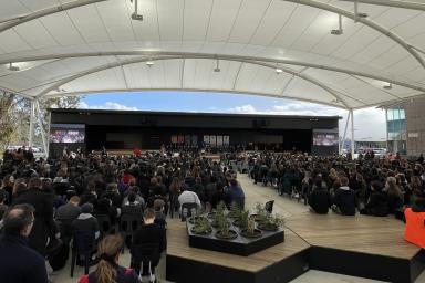 Students sitting under the pavilion at the official opening of the facility upgrade at Gawler and District College B-12